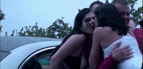  A girl is undressing on the way to a public sex gang bang dogging orgy